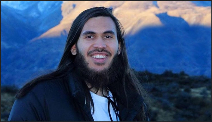 Portrait of Tariq Omar, shown with the archived Christchurch remembrance