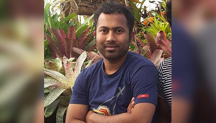 Portrait of Zakaria Bhuiyan, shown with the archived Christchurch remembrance